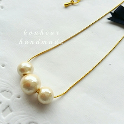 ribbon cottonpearl necklace 2枚目の画像