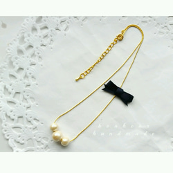 ribbon cottonpearl necklace 3枚目の画像