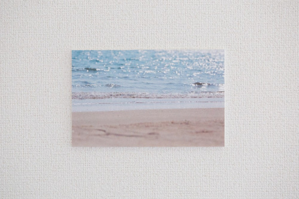 フォトパネル　水色とベージュの浜辺 1枚目の画像