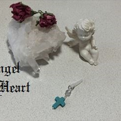～Angel　Heart～　天然石　クロス　ターコイズ　水晶　のイヤホンジャック 1枚目の画像