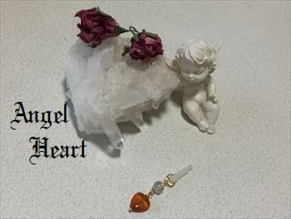 ～Angel　Heart～　天然石　ハートカーネリアン　水晶　のイヤホンジャック 1枚目の画像