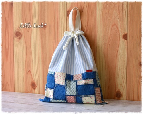 ゆゆ様専用。パッチワークの巾着袋 （ネイビー系) 《はぎれを