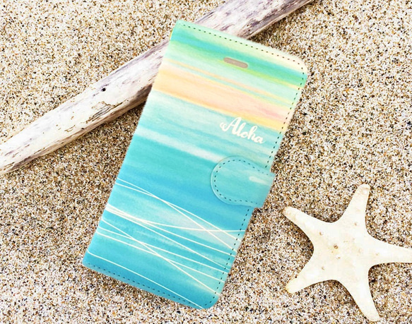 【カメラホール付】iPhone/Android 名入れ♪海色サンセット ★SUNSET SEA 手帳型スマホケース 1枚目の画像