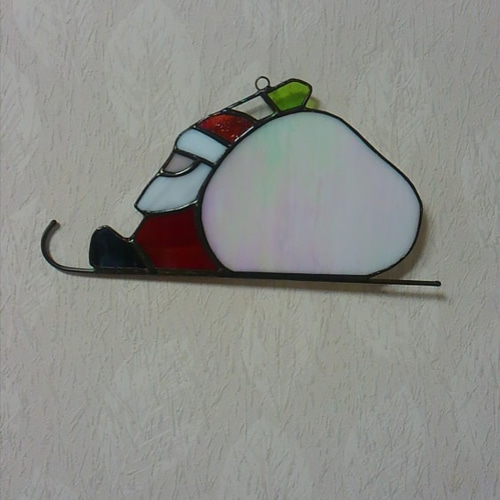 サンタクロースステンドグラス とても可愛いサンタがソリに乗ってい