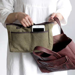 袋子（內袋）橄欖色的帆布和皮革袋 第2張的照片