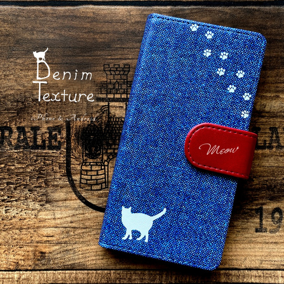 にゃんこデニムの手帳型スマホケース（ブルー×赤） iphone14 iphone15 全機種対応 猫 黒猫 デニム 1枚目の画像