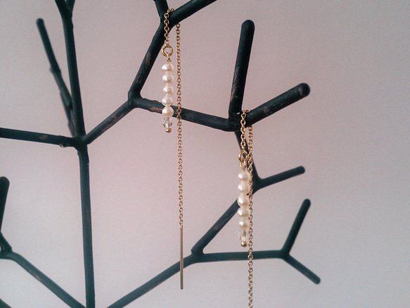 14公斤淡水珍珠和水晶美國耳環 第2張的照片