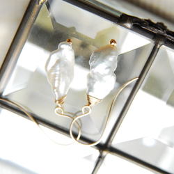 形狀獨特的白銀珍珠穿孔14kgf 第4張的照片