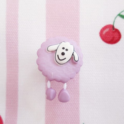 法國綿羊按鈕俏麗的綿羊紫色 第1張的照片