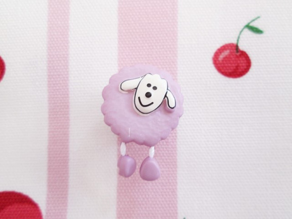 法國綿羊按鈕俏麗的綿羊紫色 第1張的照片