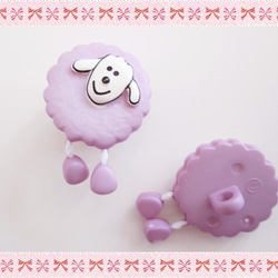 法國綿羊按鈕俏麗的綿羊紫色 第2張的照片