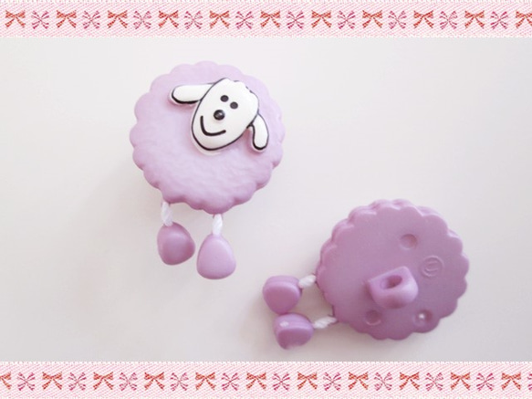 法國綿羊按鈕俏麗的綿羊紫色 第2張的照片